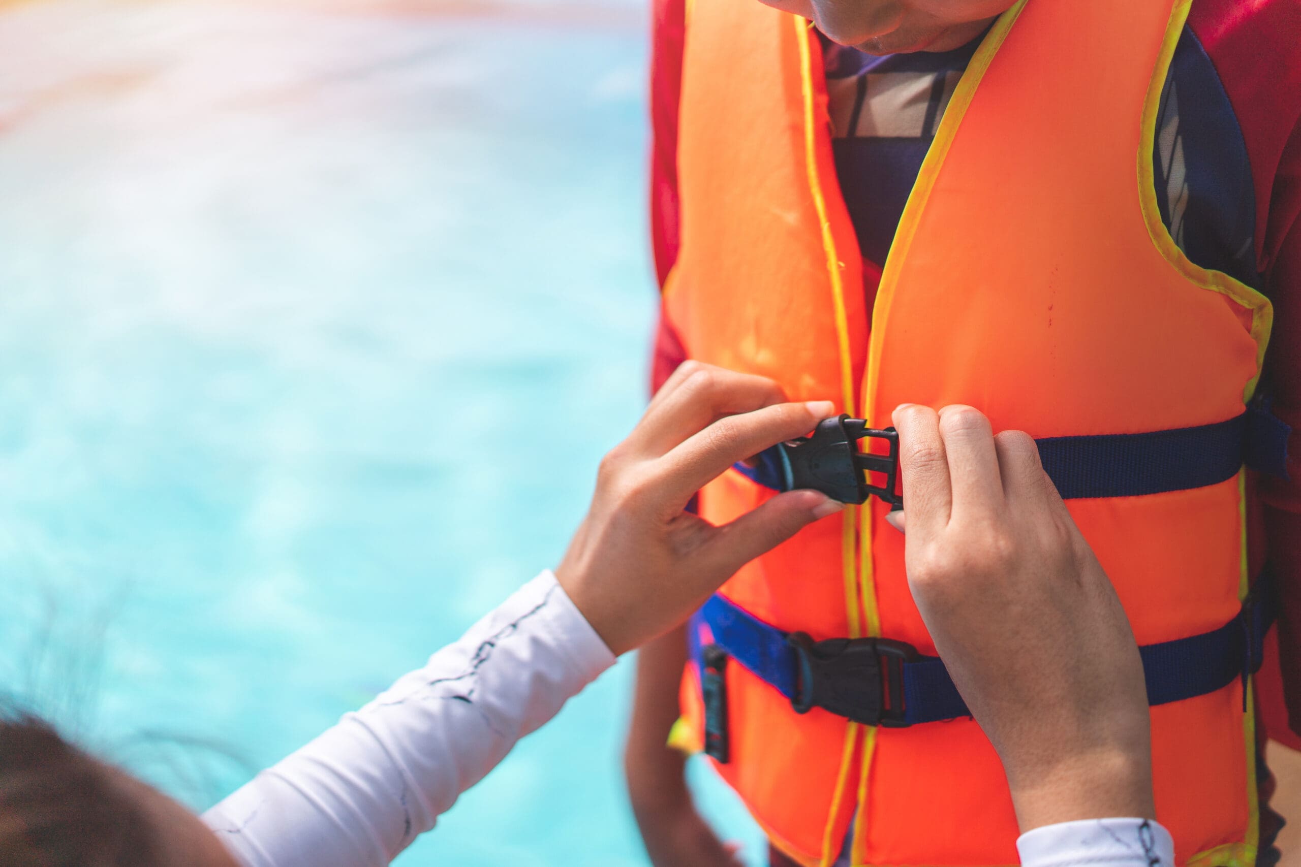 wear a life jacket before playing in swimming pool